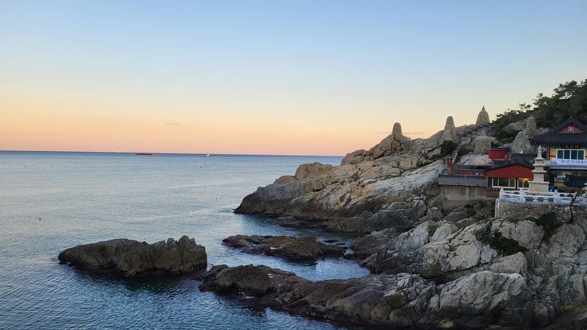 Haedong Yonggungsa beside the sea at sunset